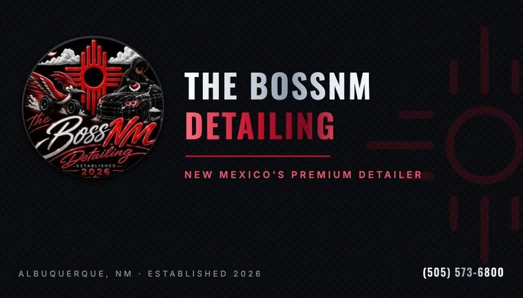 The BossNM business card, carbon black with red Zia mark